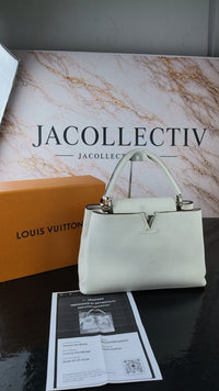 Dettaglio 7 di Louis Vuitton Capucines MM in Pelle Taurillon Bianca